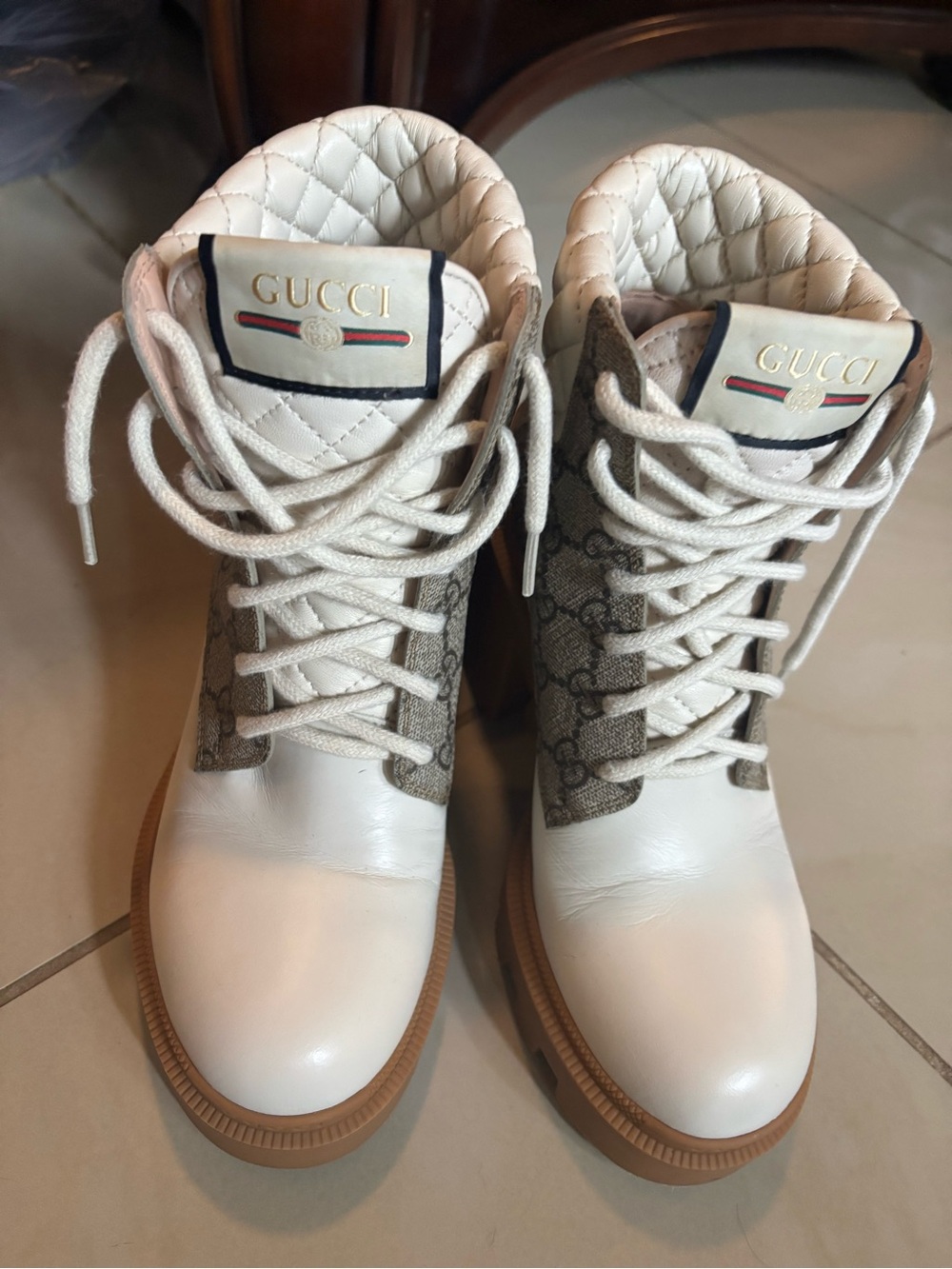 GUCCI Apollo platform lace-up boots.